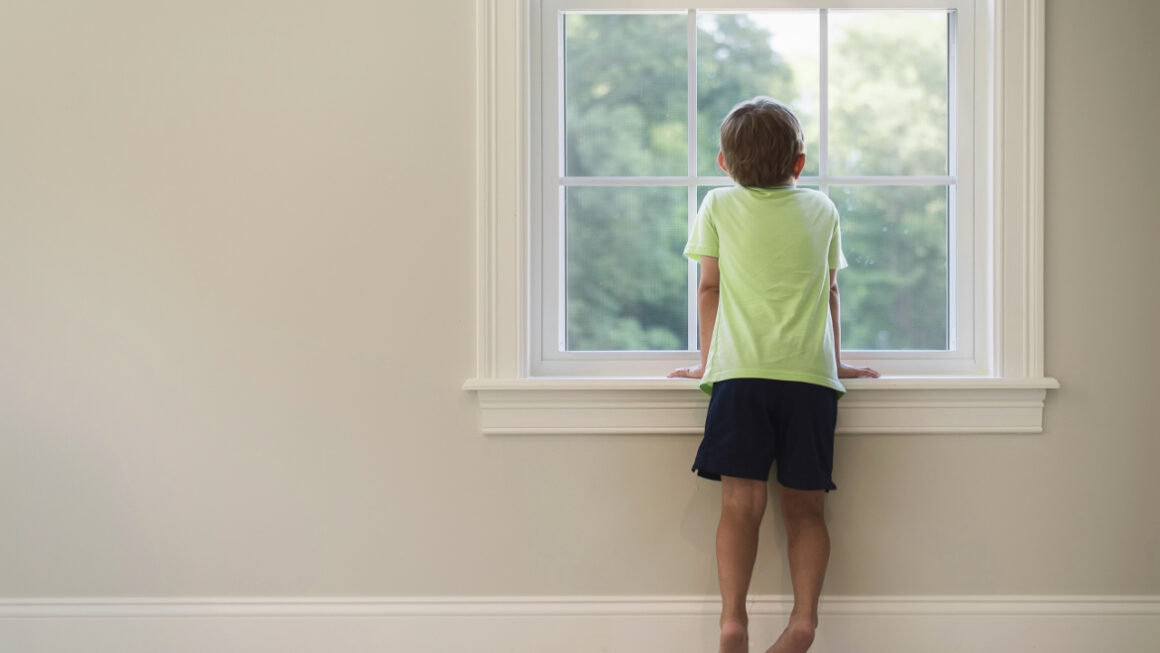 child looking out the window