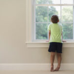 child looking out the window